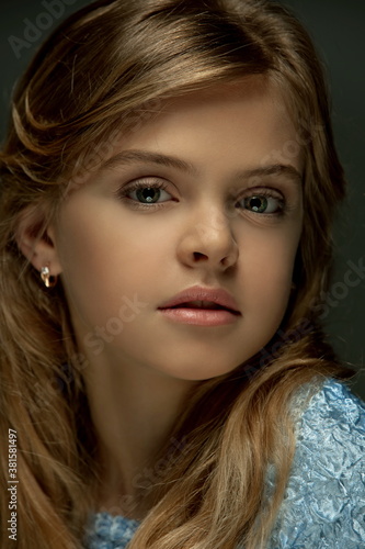 Portrait of a beautiful blonde teenager girl with skillful makeup