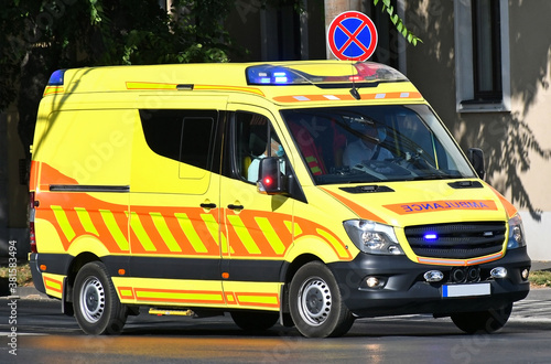 Ambulance in a hurry on the city street