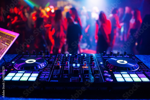 Canvas Print music controller DJ mixer in a nightclub at a party