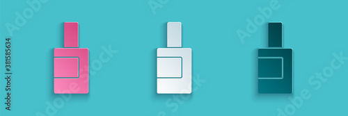 Paper cut Plastic bottle for laundry detergent, bleach, dishwashing liquid or another cleaning agent icon isolated on blue background. Paper art style. Vector.