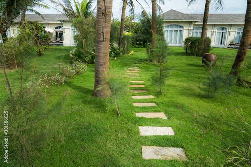 Stone paved path to the villa at tropical resort