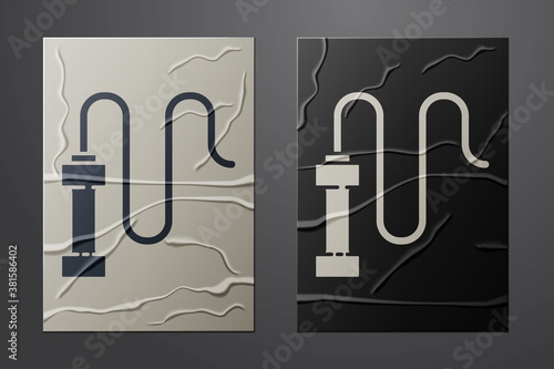 White Braided leather whip icon isolated on crumpled paper background. Paper art style. Vector.
