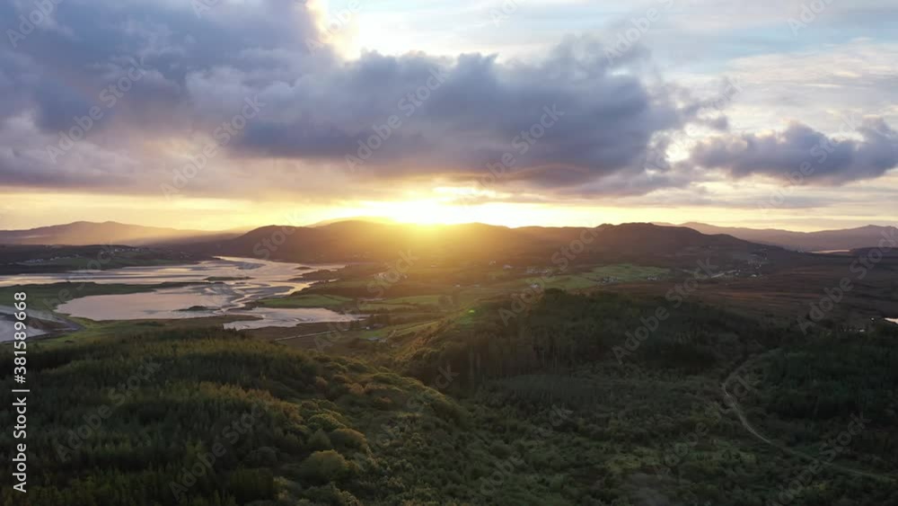Flying into the sunrise over Ballyiriston in County Donegal - Ireland. Flying into the sunrise over Ballyiriston in County Donegal - Ireland.