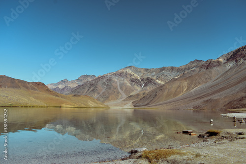 Beautiful Chandartal Lake in Spiti Valley also known as Pangong Lake of Himachal Pradesh along with huge deserty mountains.