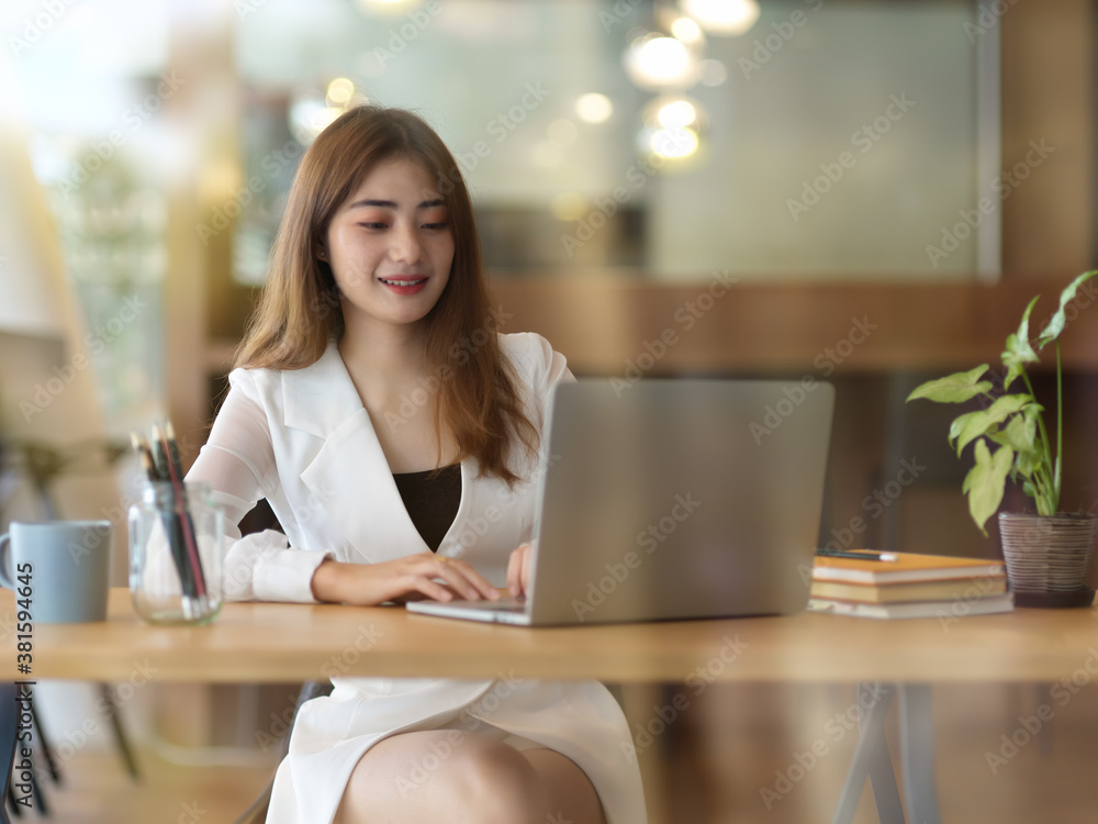 Businesswoman working on company assigntment in office room Businesswoman working on company assigntment in office room