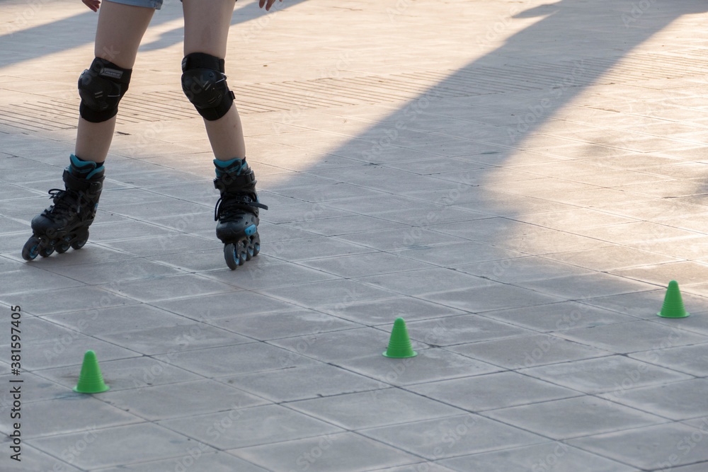 legs of a girl skating