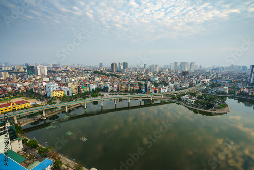 Aerial skyline view of Hanoi city, Vietnam. Hanoi cityscape by sunset period at Hoang Cau lake, Dong Da district © Hanoi Photography