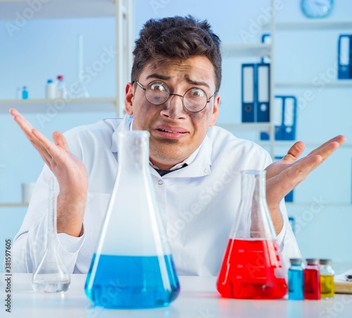 The funny mad chemist working in a laboratory