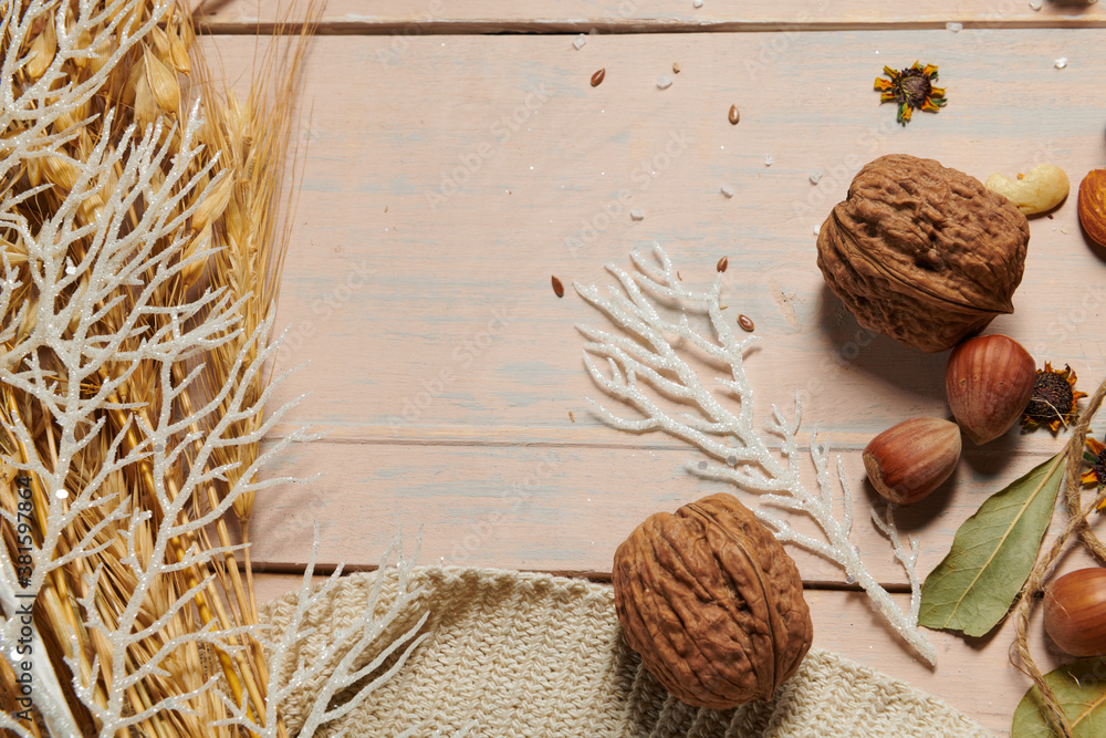 christmas decoration in rustic style and holiday background, still life on wooden backdrop, bread, nuts and other christmas decoration in rustic style and holiday background, still life on wooden backdrop, bread, nuts and other