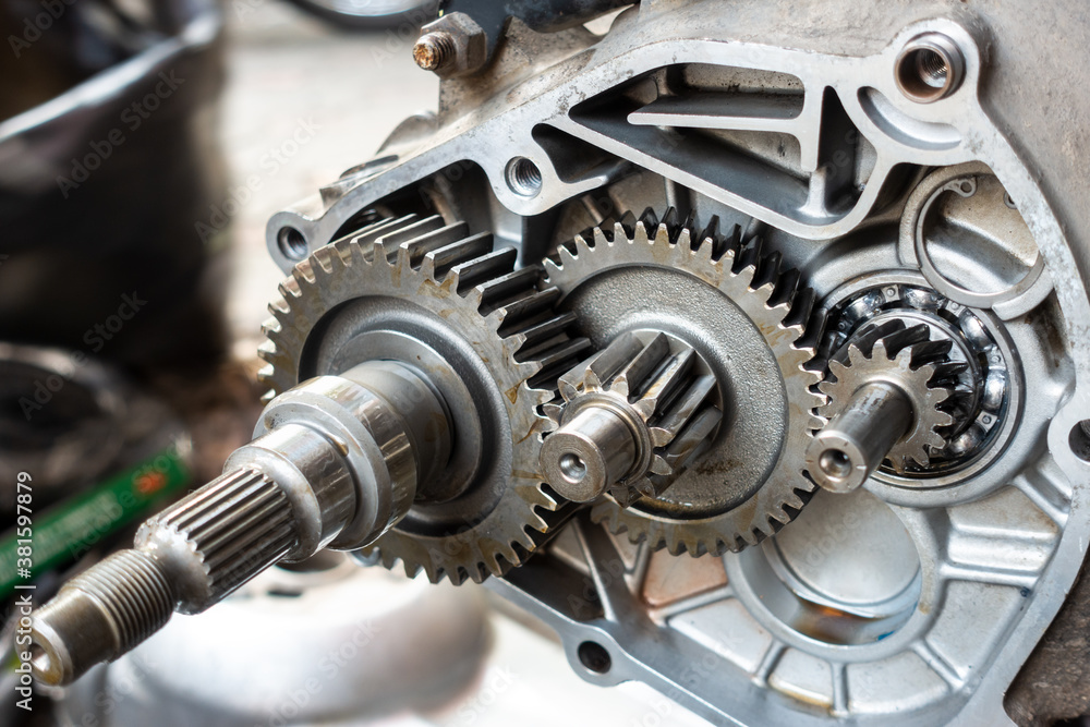 Gear in opened box of motorbike engine