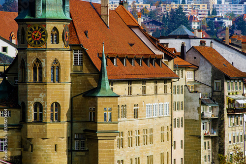 view of t St. Nicholas Cathedral and the city hall in Fribourg, Switzerland