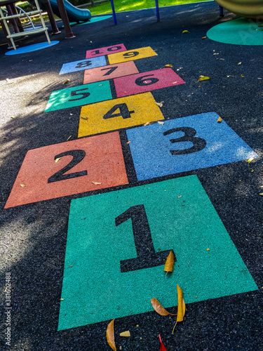 Colorful number one to ten on the floor with leaves in the playground