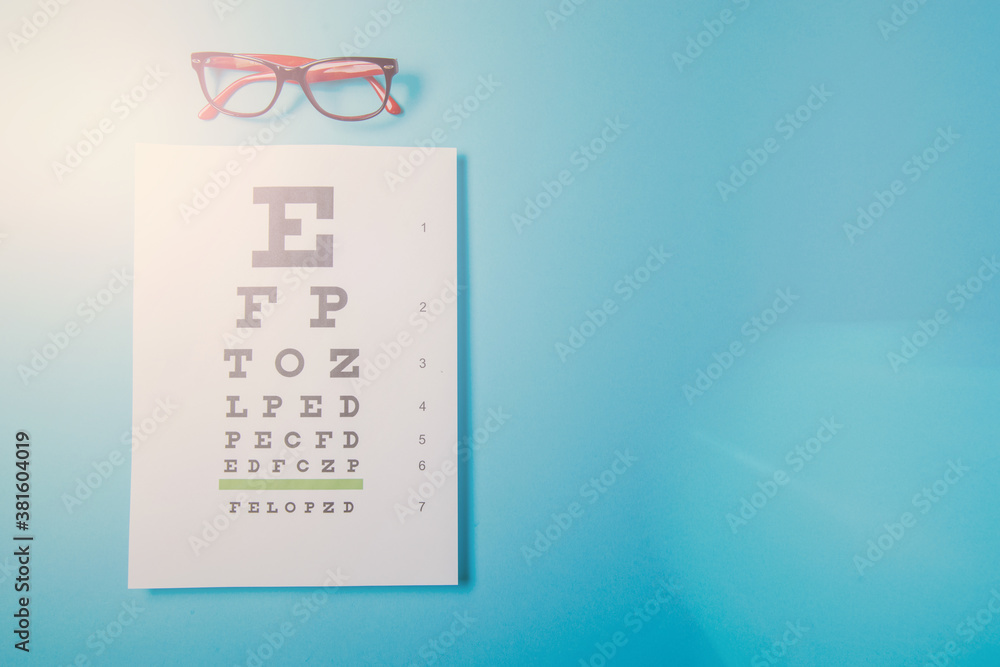 glasses lying on snellen test chart glasses lying on snellen test chart