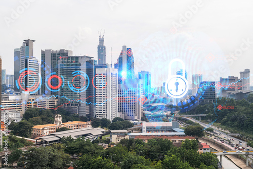 Photography Padlock icon hologram over panorama city view of Kuala Lumpur to protect business, Malaysia, Asia
