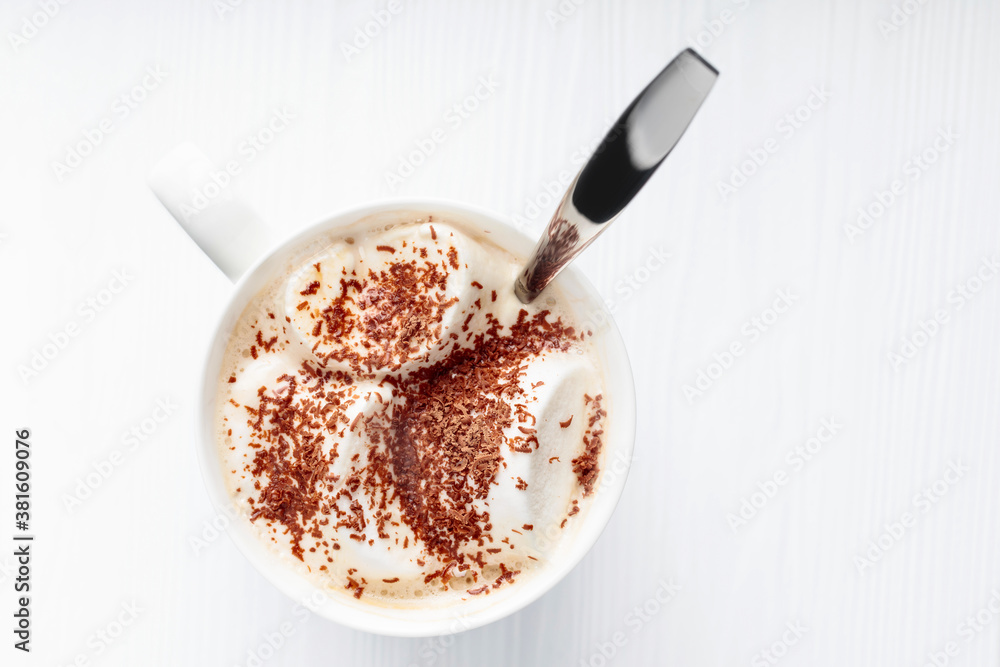 Hot chocolate and marshmallow sprinkled with chocolate chips. Hot chocolate and marshmallow sprinkled with chocolate chips.