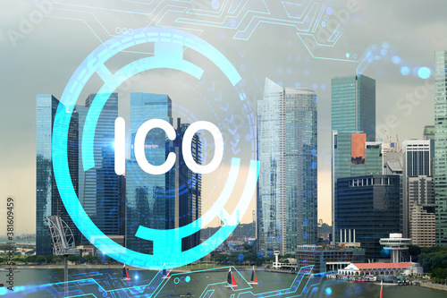 Hologram of glowing ICO icon  sunset panoramic city view of Singapore  startup incubator of cryptocurrency projects in Asia. The concept of affordable opportunities in new era. Double exposure.