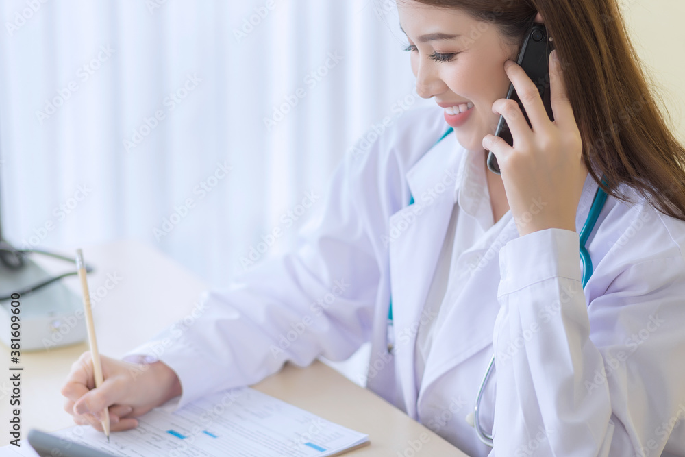 Coronavirus protection concept.Female doctor provides telephone consultation. Coronavirus protection concept.Female doctor provides telephone consultation.