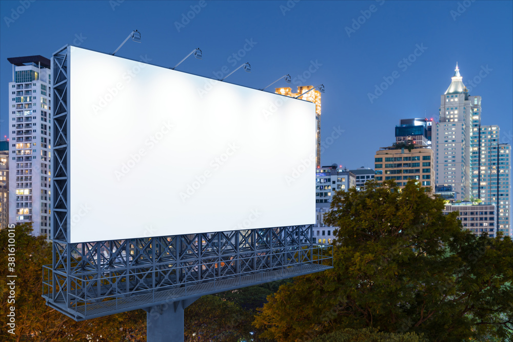 Blank white road billboard with Bangkok cityscape background at night time. Street advertising poster, mock up, 3D rendering. Side view. The concept of marketing communication to sell idea. Blank white road billboard with Bangkok cityscape background at night time. Street advertising poster, mock up, 3D rendering. Side view. The concept of marketing communication to sell idea.