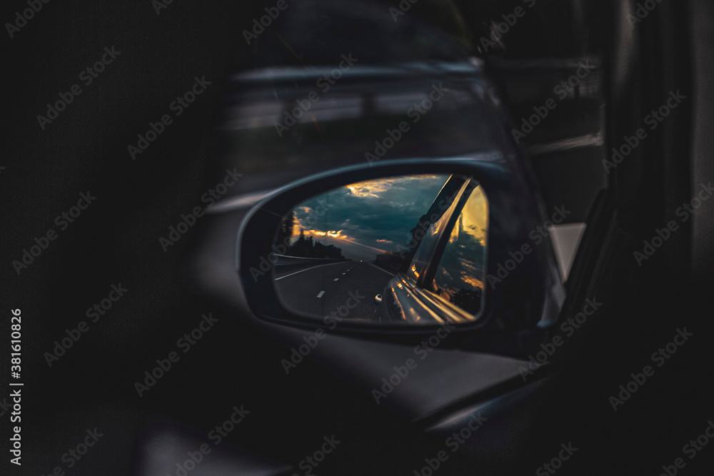 sunset in the car mirror
