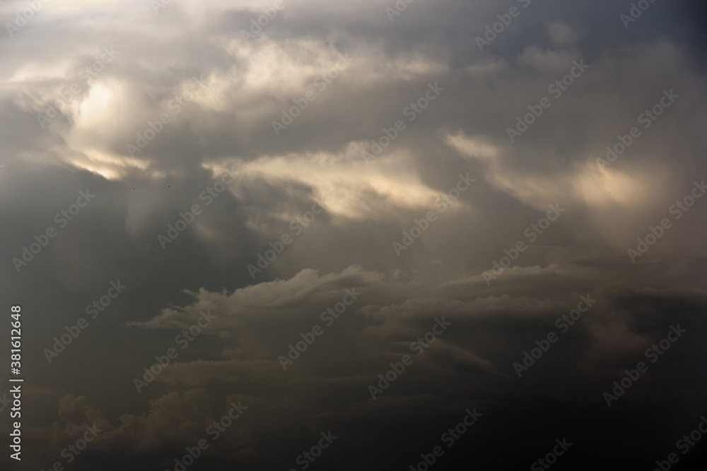 Obraz premium White yacht on sea surface and storm clouds