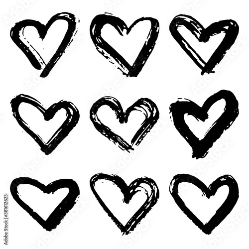 Collection of black grunge paint heart. Set of brush strokes isolated on white background. Vector illustration.