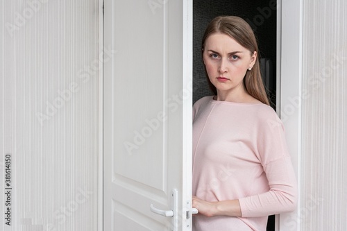 Wallpaper Mural Angry girl opens the door and enters the room, toned Torontodigital.ca