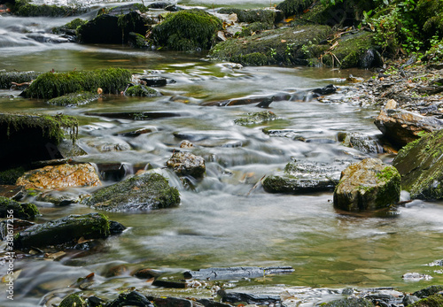 Close up of stream at St Nectan's waterfall in Cornwall photo