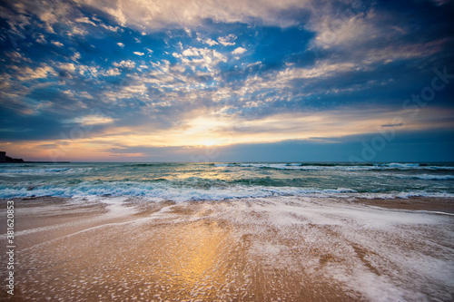 Dramatic cloudscape over the sea, sunrise shot