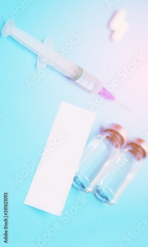 Syringe and vaccine. Coronavirus epidemic.