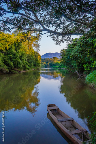 A Handmade Boat at Tranquil River © GILDASIO