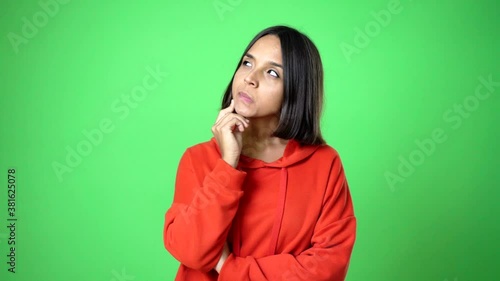 woman standing and thinking an idea pointing the finger up
