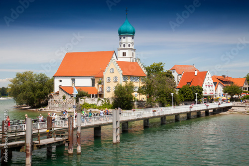 Ferry jetty,with Church of St. George, Wasserburg,lake constance Bavaria, Germany, Europe