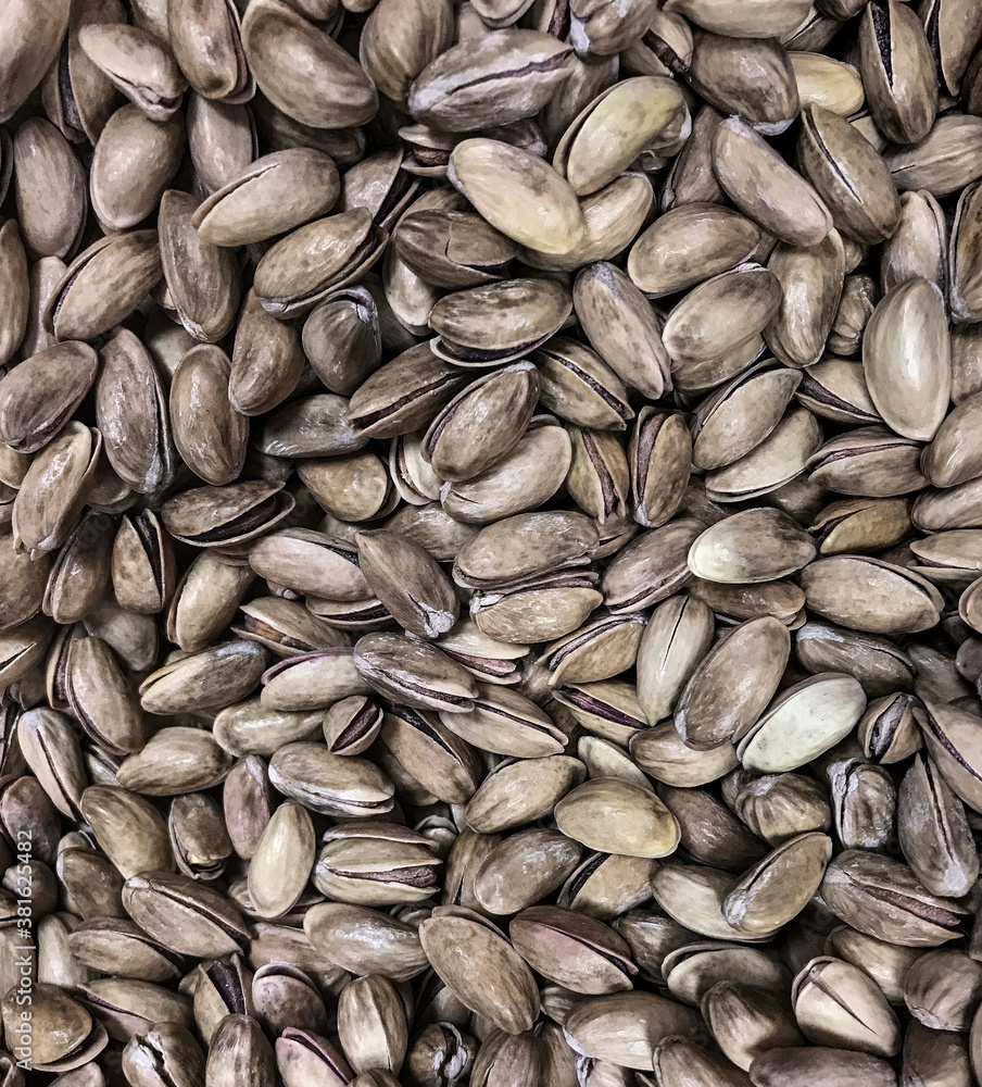 Bin of pistachios on display. Bin of pistachios on display.