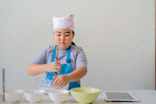 Asian children are learning to cook