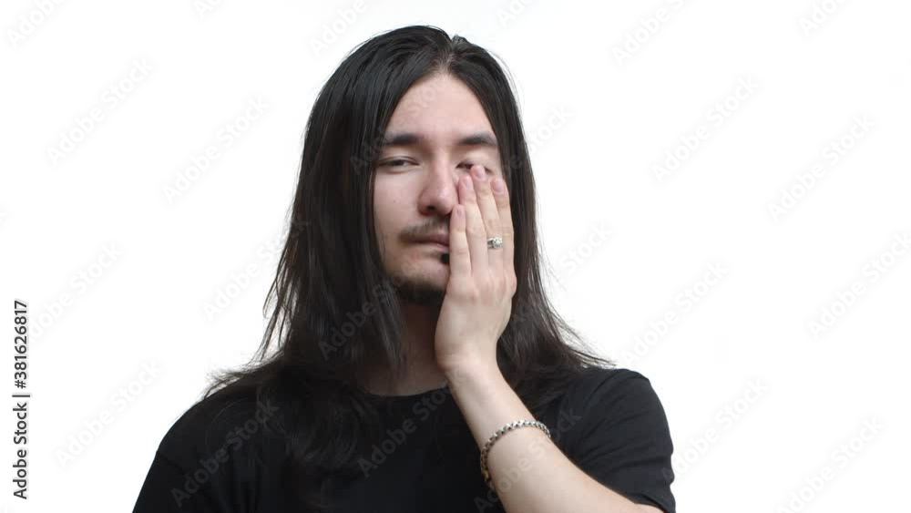 Close-up of asian rocker with piercing and long hair make facepalm, looking tired and bothered by something, standing disappointed over white background Close-up of asian rocker with piercing and long hair make facepalm, looking tired and bothered by something, standing disappointed over white background