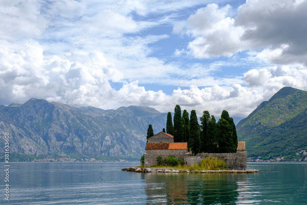Island of Saint George off the coast of Perast in Bay of Kotor, Montenegro. Island of Saint George off the coast of Perast in Bay of Kotor, Montenegro.