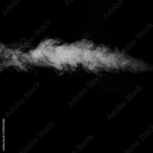 Smoke fragments on a black background. Abstract background, design element, for overlay on pictures