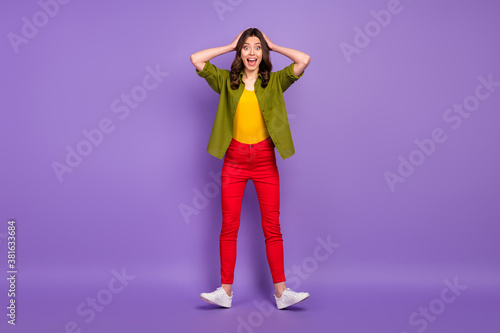 Full length body size view of her she nice attractive pretty amazed cheerful wavy-haired girl having fun great news reaction isolated on bright vivid shine vibrant lilac violet purple color background
