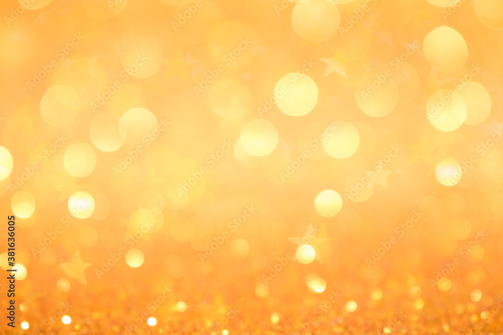 Abstract yellow background with defocused lights and bokeh in the shape of star. Holiday background. Abstract yellow background with defocused lights and bokeh in the shape of star. Holiday background.