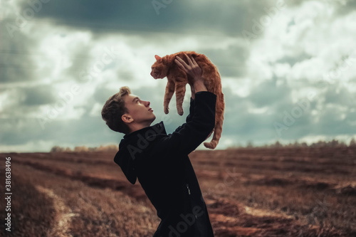 guy with a cat

