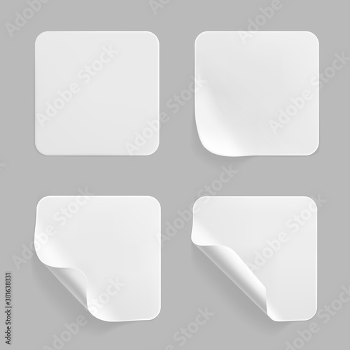 White square glued stickers with curled corners mock up set. Blank white adhesive square paper or plastic sticker label with wrinkled, crumpled effect. Blank template label tags. 3d realistic vector