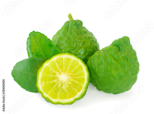 Bergamot fruit with cut in half an isolated on white background