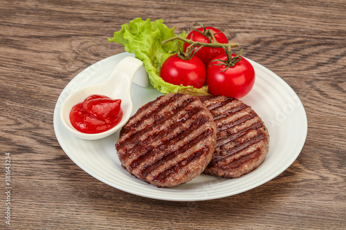 Grilled burger cutlet with sauce