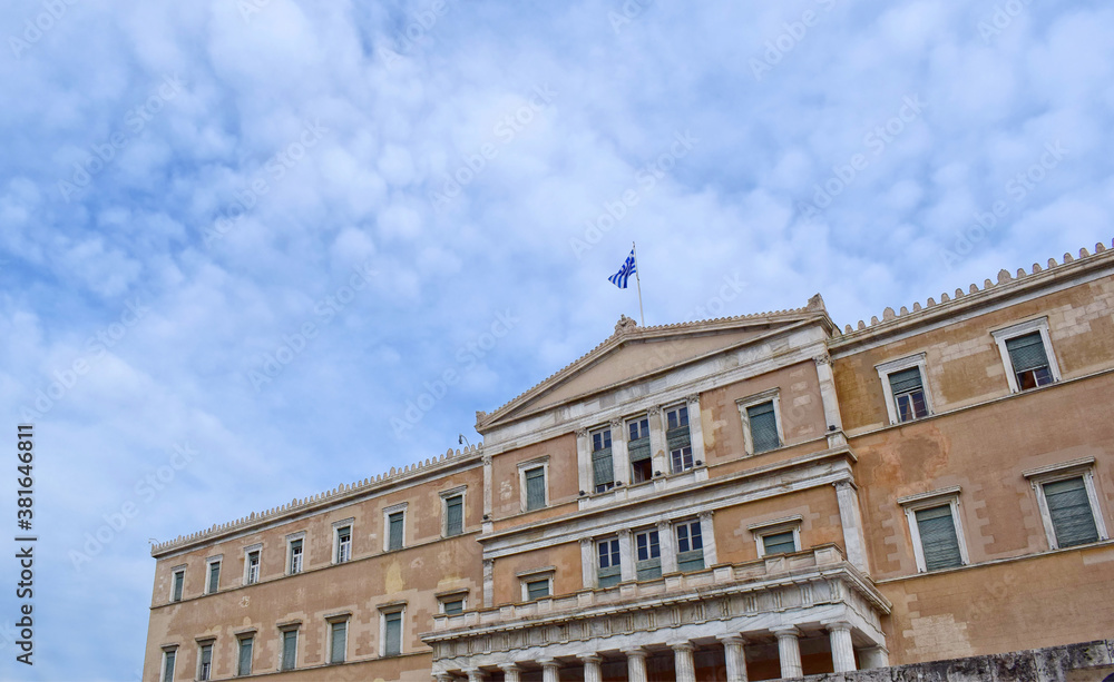 Greek Parliament at Syntagma Square, Athens. Blue sky with clouds