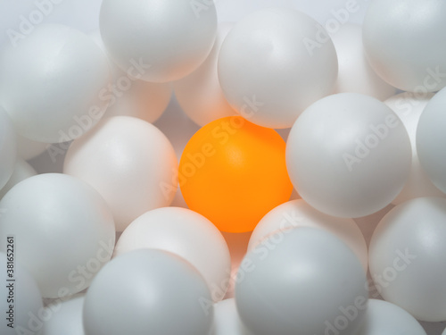 Orange and white table tennis balls Mixed colors  full background