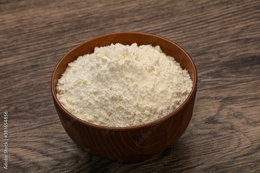 Wheat flour heap in the bowl