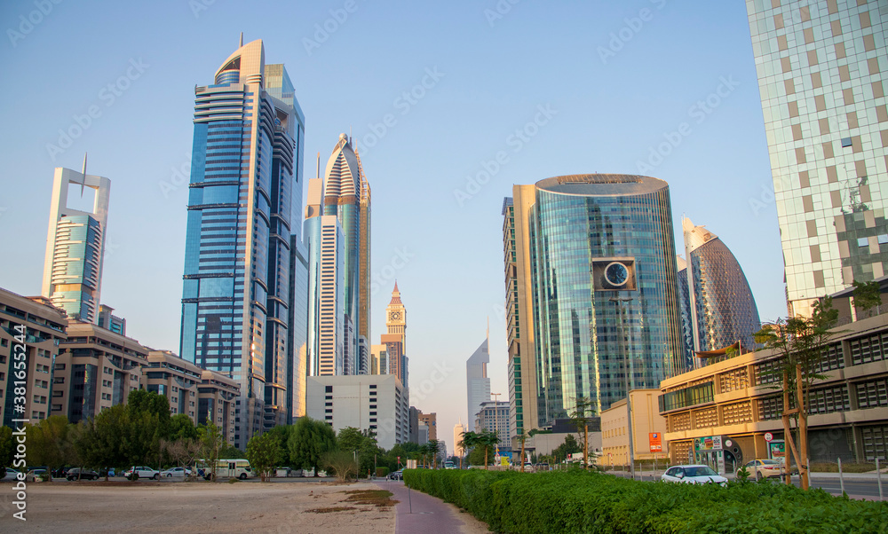 Naklejka premium Dubai Financial Center road. Landmarks such Jumeirah Emirates towers, Ritz Carlton, Park towers, DIFC on the picture.