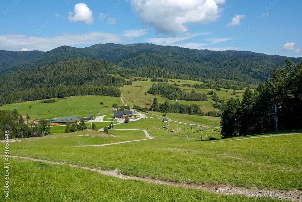 view of wooden observation tower on the Luban mountain seen from Wdzar mountain in Pieniny Mountains, Kluszkowce in Poland view of wooden observation tower on the Luban mountain seen from Wdzar mountain in Pieniny Mountains, Kluszkowce in Poland