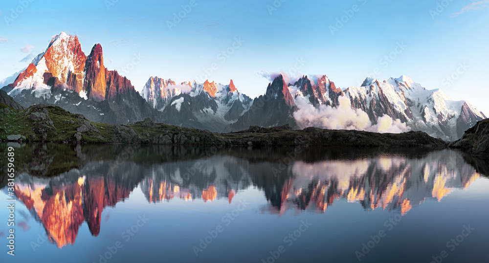 Magical sunset panorama of the Lac Blanc lake and Mont Blanc (Monte Bianco) on background, Chamonix location. Beautiful outdoor scene in Vallon de Berard Nature Reserve, France
