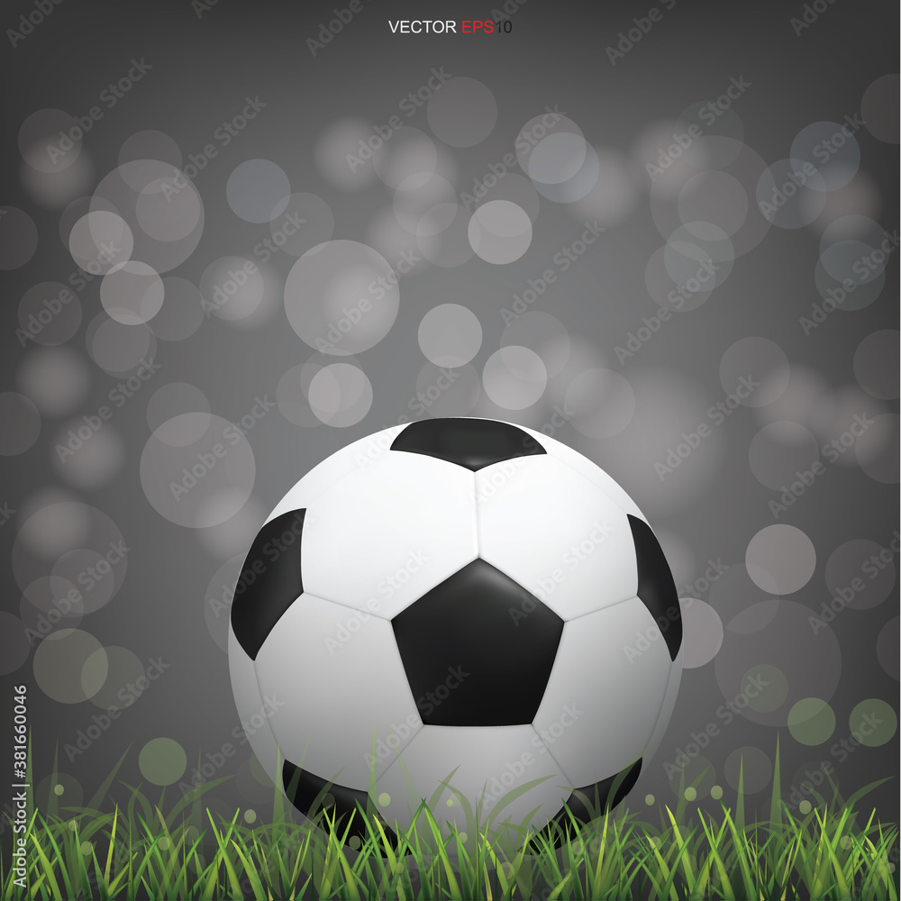 Obraz premium Soccer football ball on green grass field with light blurred bokeh background. Vector.